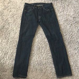 Levi’s 501 dark denim cream stitched button fly